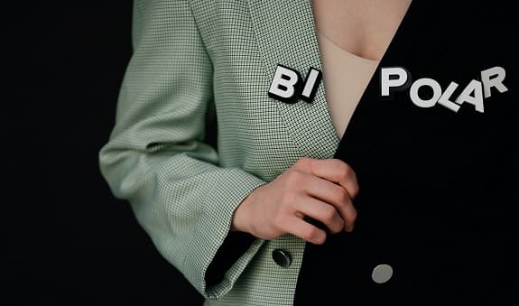 person with a jacket with bipolar written