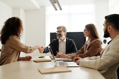 Group of people in an office are having a meeting