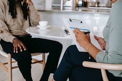 interviewer and job seeker going through interview