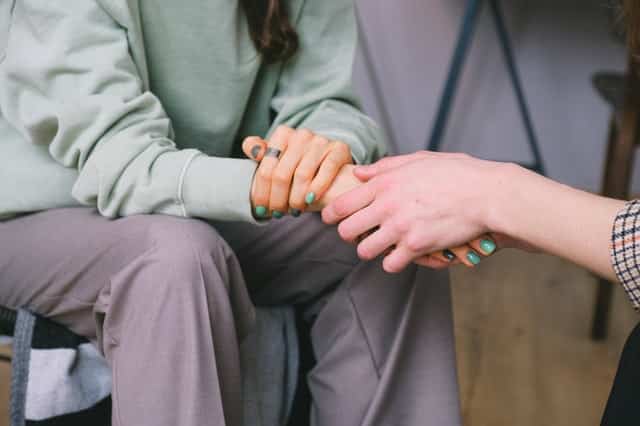 counselor with patient discussing